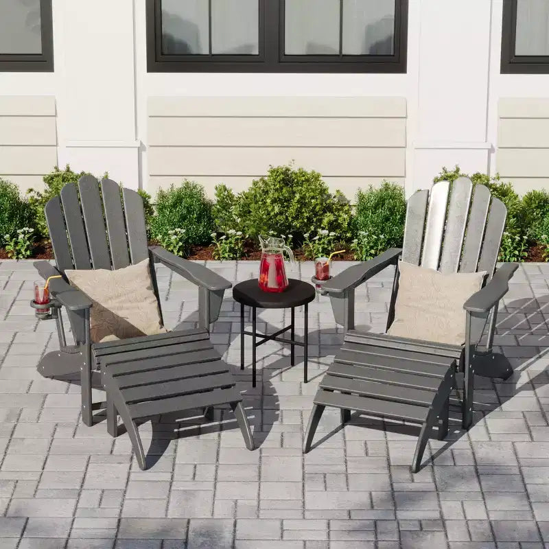 WestinTrends Highland 4-Piece Outdoor Patio HDPE Adirondack Chairs With Ottomans and Cup Holder Set