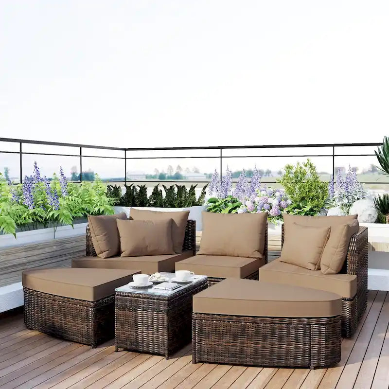 Salon de jardin en osier avec canapé rond et table basse, ensemble de sièges séparés, lit de repos, bain de soleil en rotin, causeuse convertible.