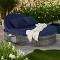Lit de jour rond en rotin pour patio extérieur avec dossiers réglables et plateaux porte-gobelets pliables