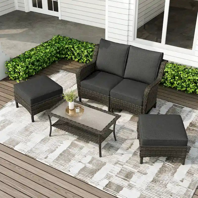 Salon de jardin en rotin avec canapé modulable et pouf