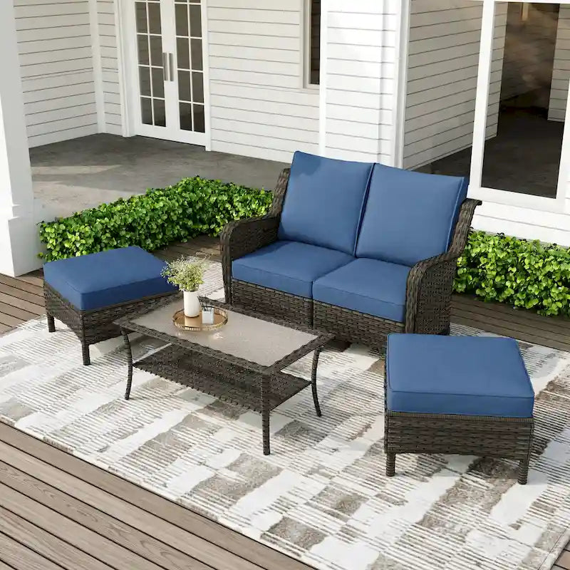 Salon de jardin en rotin avec canapé modulable et pouf