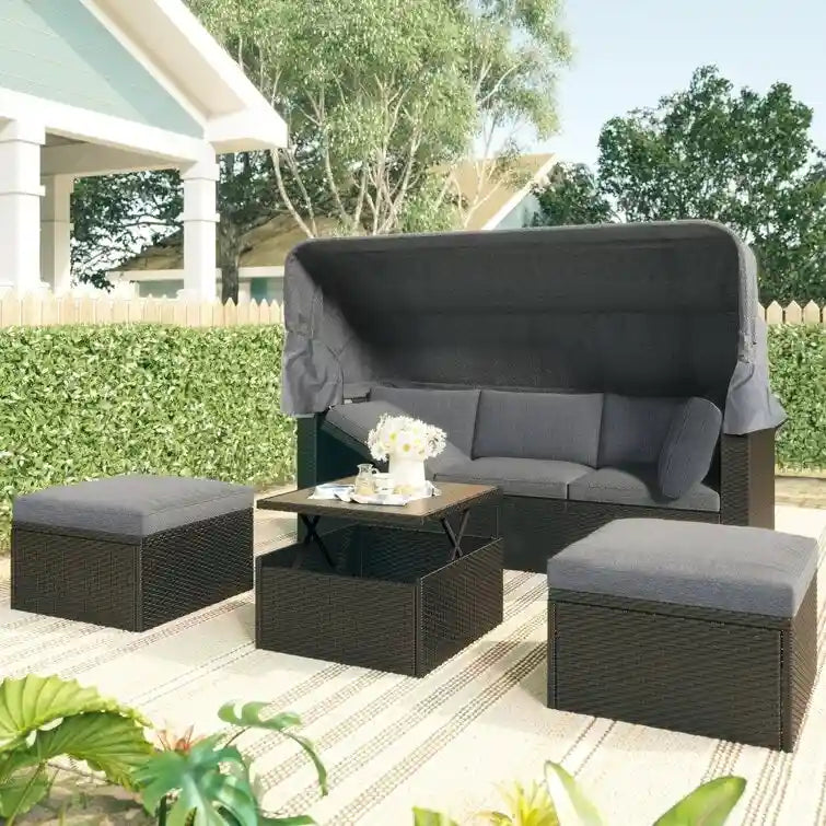 Lit de repos rectangulaire pour terrasse extérieure avec auvent rétractable et coussins