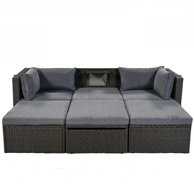 Lit de repos rectangulaire pour terrasse extérieure avec auvent rétractable et coussins