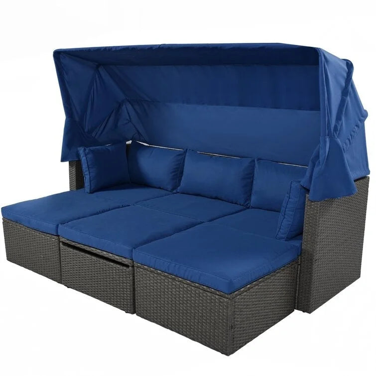 Lit de repos rectangulaire pour terrasse extérieure avec auvent rétractable et coussins