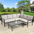 Ensemble de mobilier de patio en acier 4 pièces avec coussins beiges et table basse