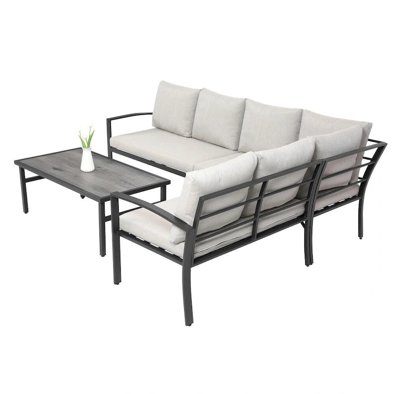 Ensemble de mobilier de patio en acier 4 pièces avec coussins beiges et table basse
