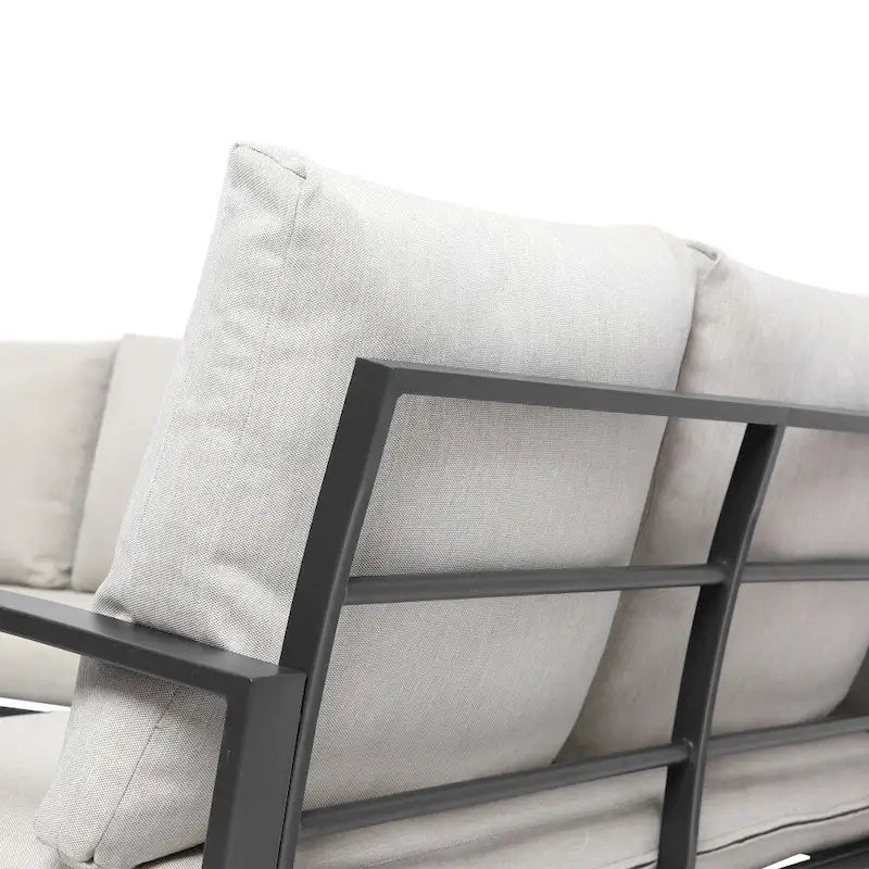 Ensemble de mobilier de patio en acier 4 pièces avec coussins beiges et table basse