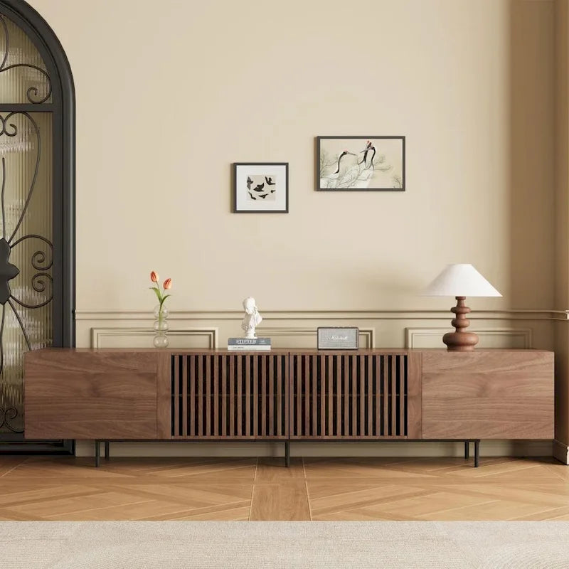 Stylish mid-century modern TV stand for up to 80 TVs. Ample storage for media devices, cable management. easy assembly.